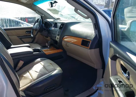 2015 Nissan Armada Platinum/Sl/Sv z USA, uszkodzony, nr VIN 5N1AA0NE5FN615754